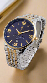 Wristwatch with a blue dial and two-tone metal band on a white background